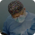 surgeon wearing mask and surgical hats
